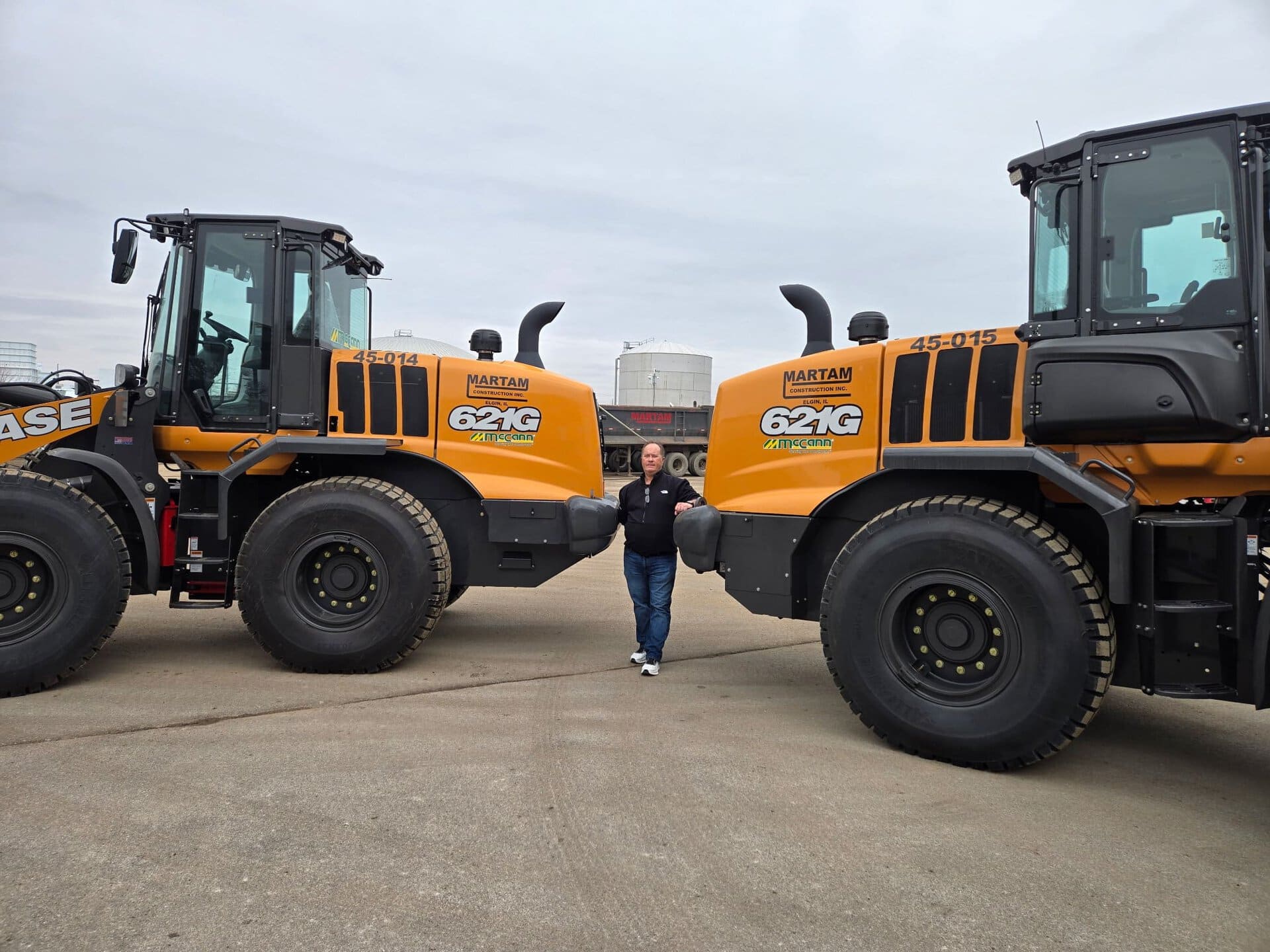 Large construction loaders at Martam Construction site, showcasing heavy machinery for building proj.
